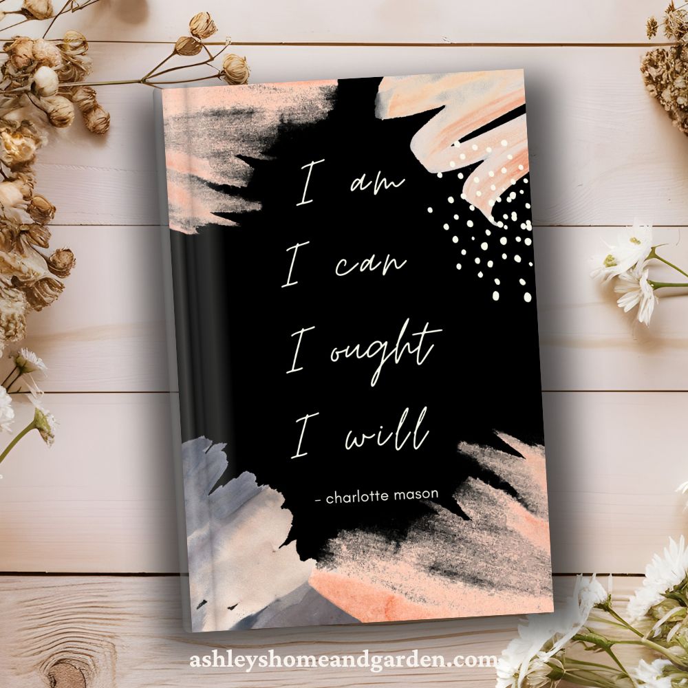 Pink, gray and black notebook with Charlotte Mason Quote on cover