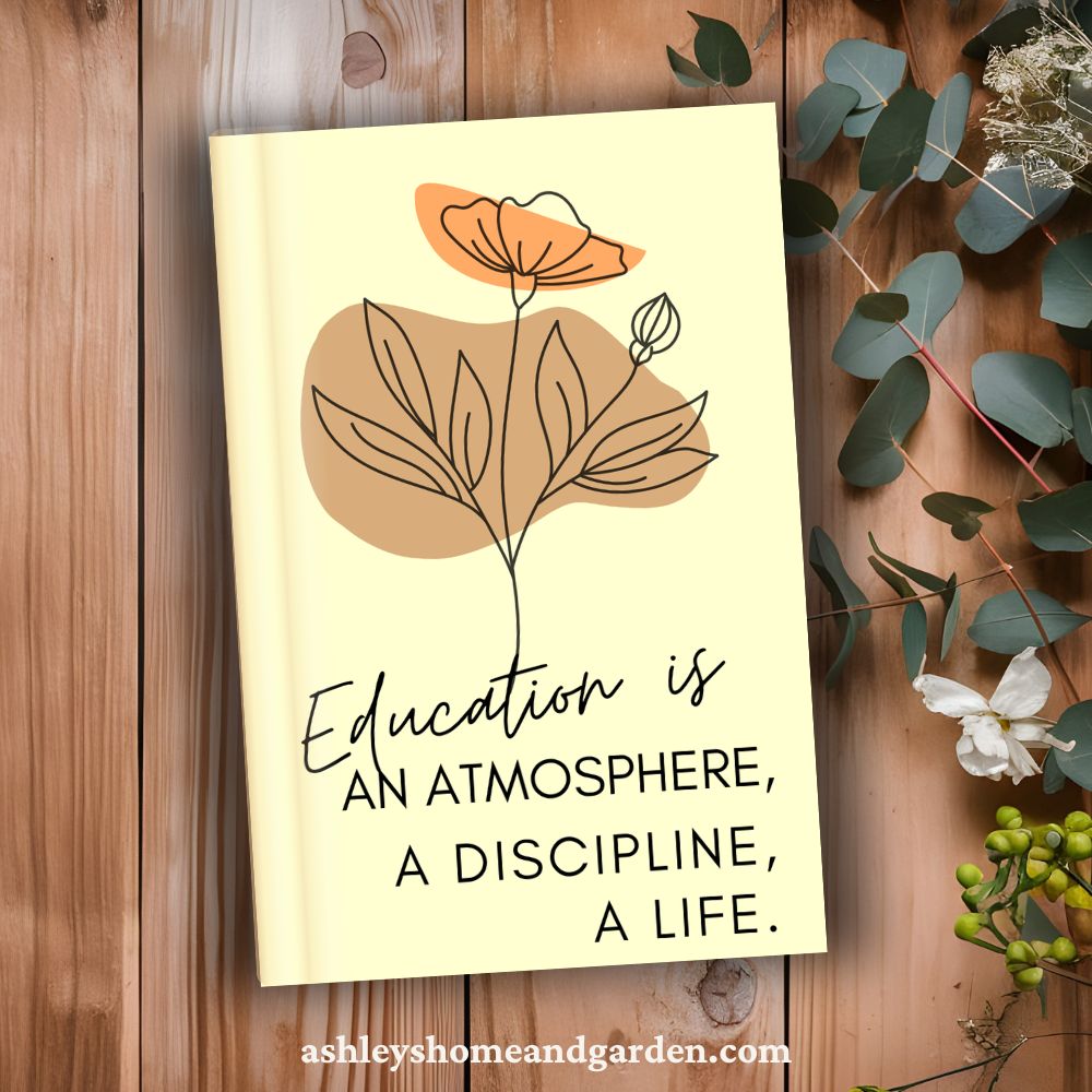 Cream notebook with drawn flower and Charlotte Mason Quote on the cover